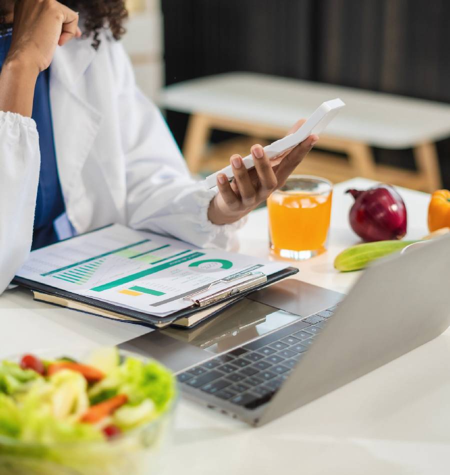Family enjoying healthy food with a nutritionist